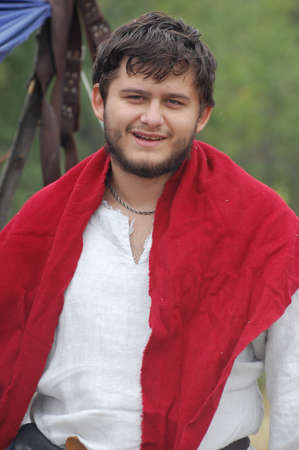 KIEV, UKRAINE - JULY 31: Member of history club Golden Capricorn wears medieval costume as he participates in historical festival and camp in memory of King Vladimir July 31, 2009 in Kiev, Ukraine. のeditorial素材