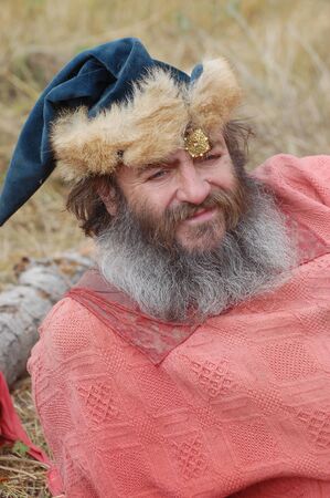 KIEV, UKRAINE - JULY 31: Member of history club Golden Capricorn wears medieval costume as he participates in historical festival and camp in memory of King Vladimir July 31, 2009 in Kiev, Ukraine. のeditorial素材