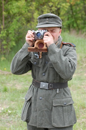 KIEV, UKRAINE - MAY 9: A member of a military history club wears a historical German uniform as he...