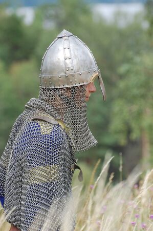 KIEV, UKRAINE - JULY 31: Member of history club Golden Capricorn wears medieval costume as he participates in historical festival and camp in memory King Vladimir July 31, 2009 in Kiev, Ukraine のeditorial素材