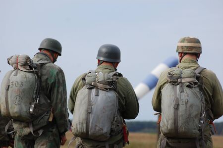 CHERNIGOW, UKRAINE - AUG 29: Members of Red Star military history club wear historical German paratrooper uniform during historical reenactment of WWII, August 29, 2010 in Chernigow, Ukraine のeditorial素材