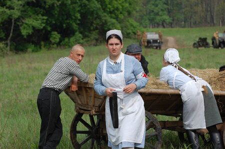 KIEV, UKRAINE - MAY 10 : member of Red Star history club wears historical military German paramedic uniform during historical reenactment of 1945 WWII, May 10, 2010 in Kiev, Ukraine のeditorial素材