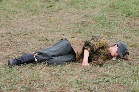 KIEV, UKRAINE - MAY 10 : member of Red Star history club wears historical military German paramedic...