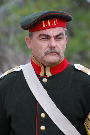 CRIMEA, UKRAINE - SEPTEMBER 26: Member of military history club ALMA wears Russian historical uniform during historical reenactment of Crimean War September 26, 2009 , Crimea, Ukraine のeditorial素材