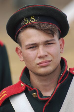 CRIMEA, UKRAINE - SEPTEMBER 26: Member of military history club ALMA wears Russian historical uniform during historical reenactment of Crimean War September 26, 2009 , Crimea, Ukraine のeditorial素材