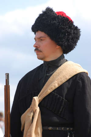CRIMEA, UKRAINE - SEPTEMBER 26: Member of military history club ALMA wears Russian historical uniform during historical reenactment of Crimean War September 26, 2009 , Crimea, Ukraine のeditorial素材