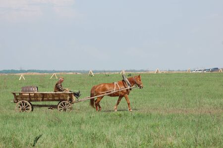 KIEV, UKRAINE - MAY 10 : A member of Red Star history club wears historical Russian costume during historical reenactment of 1945 WWII, May 10, 2010 in Kiev, Ukraine のeditorial素材
