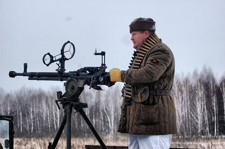 KIEV, UKRAINE - FEB 20: A member of military history club RedStar  wears historical Soviet uniform ...