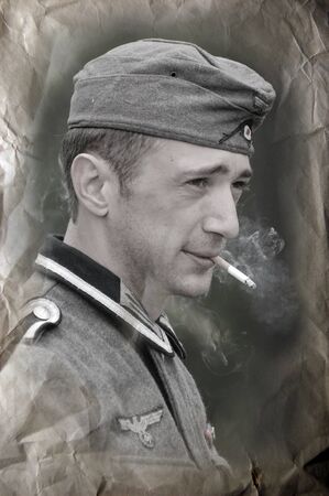 KIEV, UKRAINE, 10 MAY 2008: Member of military history club Red Star. Person in German WW2 military uniform. Historical military reenacting in Kiev, Ukraine, 8-10 May, 2008 のeditorial素材