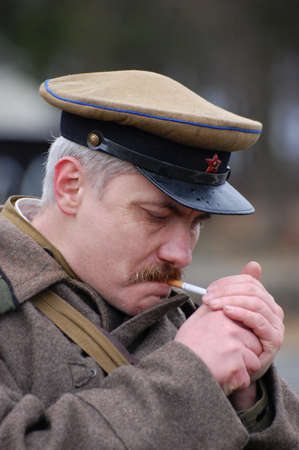 KIEV, UKRAINE - FEB 23, 2008: Military history club Red Star.Red Army Day celebration. Person in Soviet WW2 military uniform. Historical reenacting in Kiev, Ukraine, February 23, 2008のeditorial素材