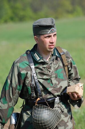 KIEV, UKRAINE, 10 MAY 2008: Member of military history club Red Star. Person in German WW2 military...