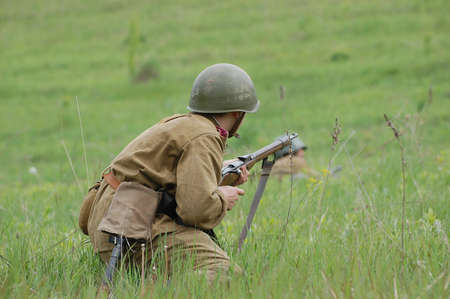 KIEV, UKRAINE, 10 MAY 2008: Member of military history club Red Star. Person in Soviet WW2 military uniform. Historical military reenacting Kiev, Ukraine, 8-10 May, 2008のeditorial素材