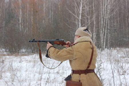 KIEV, UKRAINE - FEB 20: A member of military history club Red Star wears historical Soviet uniform during historical reenactment of WWII,February 20, 2011 in Kiev, Ukraine のeditorial素材