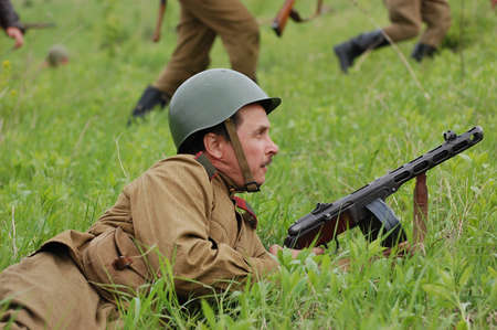 KIEV, UKRAINE, 10 MAY 2008: Member of military history club Red Star. People in Soviet WW2 military uniform. Historical military reenacting in Kiev, Ukraine. 8-10 May 2008. のeditorial素材