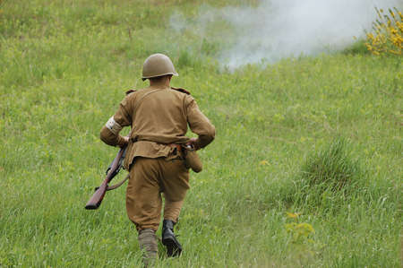 KIEV, UKRAINE, 10 MAY 2008: Member of military history club Red Star. People in Soviet WW2 military uniform. Historical military reenacting in Kiev, Ukraine. 8-10 May 2008. のeditorial素材