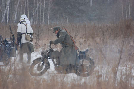 KIEV, UKRAINE - FEB 20: Members of Red Star military history club wear historical German uniform during historical reenactment of WWII,February 20, 2011 in Kiev, Ukraine のeditorial素材