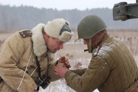 KIEV, UKRAINE - FEB 20: Members of military history club RedStar wear historical Soviet uniform...