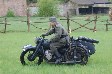 KIEV, UKRAINE - MAY 6 : Member of Red Star history club wears historical German uniform during historical reenactment of WWII, May 6, 2011 in Kiev, Ukraine のeditorial素材