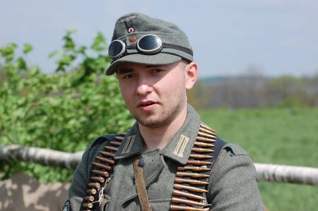 KIEV, UKRAINE - MAY 8 : Member of Red Star history club wears historical German uniform during...