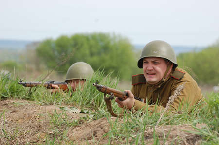 KIEV, UKRAINE - MAY 8 : A member of Red Star history club wears historical Soviet uniform during historical reenactment of WWII on May 8, 2011 in Kiev, Ukraine のeditorial素材