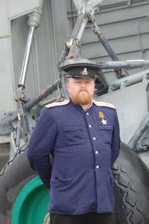 KIEV, UKRAINE - MAY 6 : A member of Red Star history club wears historical Soviet Naval uniform...