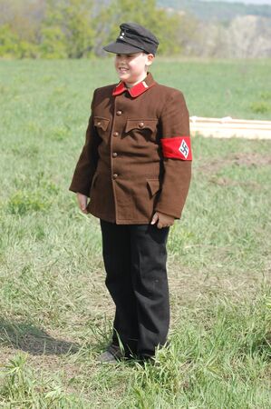 KIEV, UKRAINE - MAY 8 : Member of Red Star history club wears historical German uniform during historical reenactment of WWII on May 8, 2011 in Kiev, Ukraine のeditorial素材