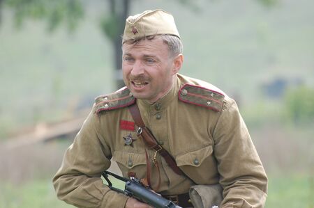 KIEV, UKRAINE - MAY 8 : An unidentified member of Red Star history club wears historical Soviet...
