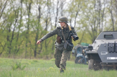KIEV, UKRAINE - MAY 8 : An unidentified member of Red Star history club wears historical German uniform during historical reenactment of WWII on May 8, 2011 in Kiev, Ukraineのeditorial素材
