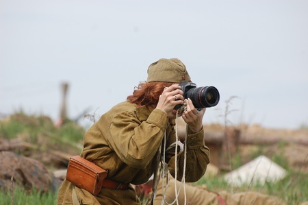 KIEV, UKRAINE - MAY 8 : An unidentified member of Red Star history club wears historical Soviet uniform during historical reenactment of WWII on May 8, 2011 in Kiev, Ukraine のeditorial素材