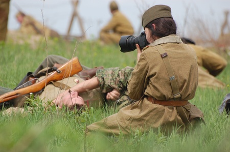 KIEV, UKRAINE - MAY 8 : An unidentified member of Red Star history club wears historical Soviet uniform during historical reenactment of WWII on May 8, 2011 in Kiev, Ukraine のeditorial素材
