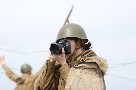 KIEV, UKRAINE - MAY 8 : An unidentified member of Red Star history club wears historical Soviet uniform during historical reenactment of WWII on May 8, 2011 in Kiev, Ukraine のeditorial素材
