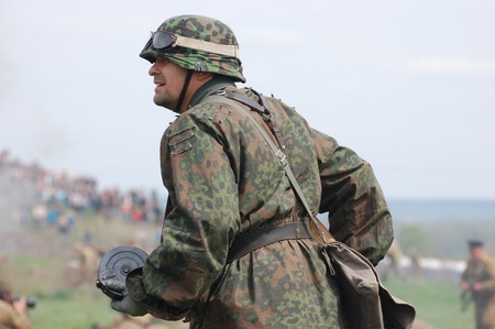KIEV, UKRAINE - MAY 8 : Member of Red Star history club wears historical German uniform during historical reenactment of WWII on May 8, 2011 in Kiev, Ukraine のeditorial素材