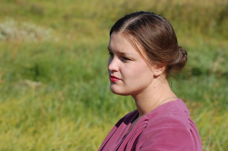 KIEV, UKRAINE -SEPT 17 : A member of Red Star history club wears historical Russian costume during historical reenactment of WWII, September 17, 2011 in Kiev, Ukraine のeditorial素材