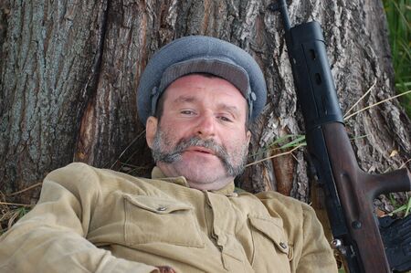 KIEV, UKRAINE -SEPT 18 : A member of Red Star history club wears historical Russian costume during historical reenactment of WWII, September 18, 2011 in Kiev, Ukraine のeditorial素材