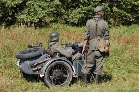 KIEV, UKRAINE -SEPT 18 : Members of Red Star history club wear historical German uniform during historical reenactment of WWII, September 18, 2011 in Kiev, Ukraine のeditorial素材