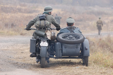 KIEV, UKRAINE -NOV 6: Unidentified members of Red Star history club wear historical German uniform during historical reenactment of WWII, November 6, 2011 in Kiev, Ukraine のeditorial素材
