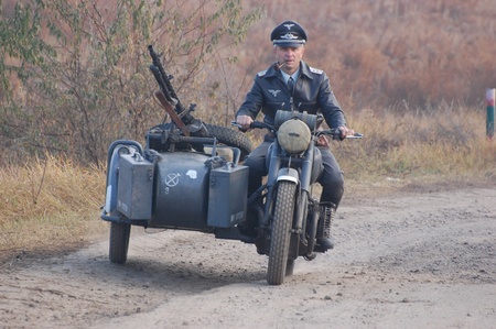 KIEV, UKRAINE -NOV 6: Unidentified members of Red Star history club wear historical German uniform during historical reenactment of WWII, November 6, 2011 in Kiev, Ukraine のeditorial素材