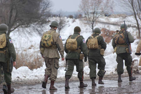 KIEV, UKRAINE -FEB 25:Unidentified members of Red Star history club wear historical American uniforms during historical reenactment of WWII, on February 25, 2012 in Kiev, Ukraine のeditorial素材