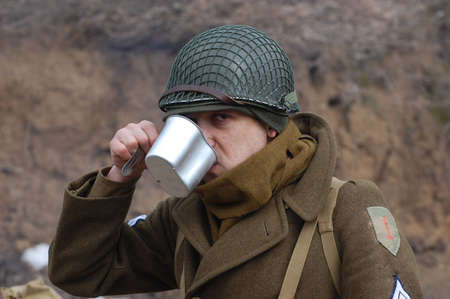 KIEV, UKRAINE -FEB 25: Unidentified member of Red Star history club wears historical American uniforms during historical reenactment of WWII,Military history club Red Star on February 25, 2012 in Kiev, Ukraine のeditorial素材