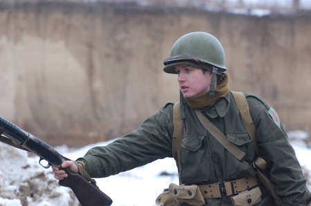 KIEV, UKRAINE -FEB 25: Unidentified member of Red Star history club wears historical American uniforms during historical reenactment of WWII,Military history club Red Star on February 25, 2012 in Kiev, Ukraine のeditorial素材