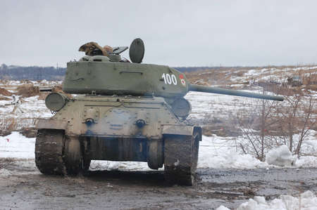 KIEV, UKRAINE -FEB 25: Old Russian tank T-34 during historical reenactment of WWII,Military history club Red Star. February 25, 2012 in Kiev, Ukraine のeditorial素材