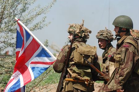 KIEV, UKRAINE - MAY 11 : An unidentified members of Red Star history club wear historical British uniform during historical reenactment of WWII on May 11, 2013 in Kiev, Ukraineのeditorial素材