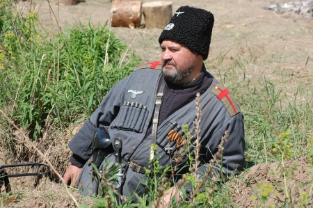 KIEV, UKRAINE -MAY 11: Member of Red Star history club wears historical uniform cossack of Corps von...