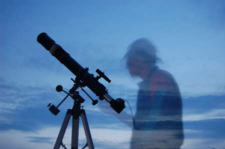 Adult man and telescope Near Kiev,Ukraine