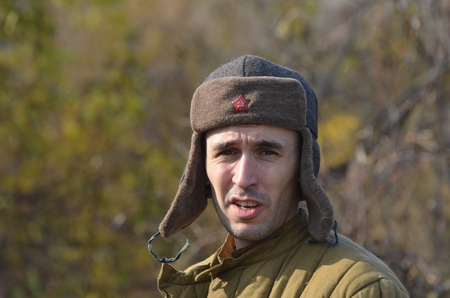 KIEV, UKRAINE -NOV 1  An unidentified member of Red Star history club wears historical Soviet...