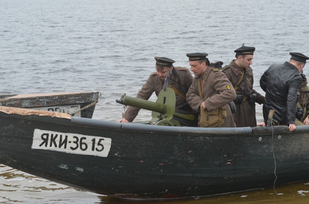 KIEV, UKRAINE -NOV 3  An unidentified members of Red Star history club wear historical Soviet uniform during historical reenactment of WWII, Dnepr river crossing 1943, November 3, 2013   Kiev, Ukraineのeditorial素材