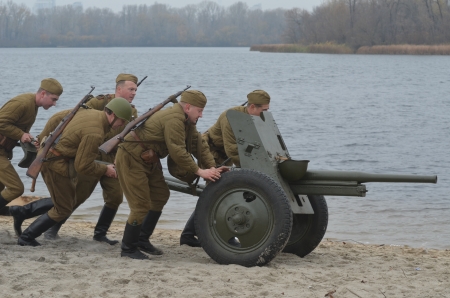 KIEV, UKRAINE -NOV 3  An unidentified members of Red Star history club wear historical Soviet uniform during historical reenactment of WWII, Dnepr river crossing 1943, November 3, 2013   Kiev, Ukraineのeditorial素材