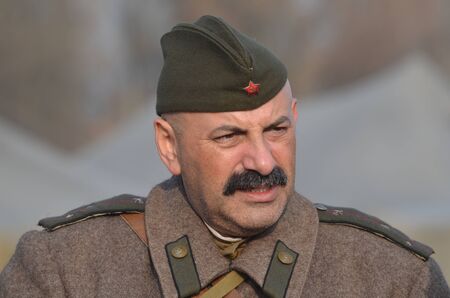 KIEV, UKRAINE -NOV 3  An unidentified members of Red Star history club wear historical Soviet uniform during historical reenactment of WWII, Dnepr river crossing 1943, November 3, 2013   Kiev, Ukraineのeditorial素材