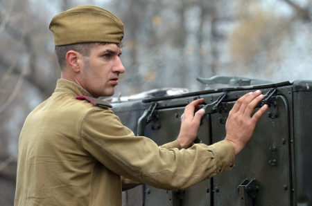 KIEV, UKRAINE -NOV 3 An unidentified member of Red Star history club wears historical Soviet uniform...