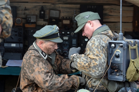 KIEV, UKRAINE -NOV 3  An unidentified members of Red Star history club wear historical German uniform during historical reenactment of WWII, Dnepr river crossing 1943, November 3, 2013 Kiev, Ukraine のeditorial素材